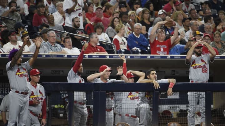 SAN DIEGO, CA - SEPTEMBER 7: St. Louis Cardinals players point out from the dugout after Breyvic Valera