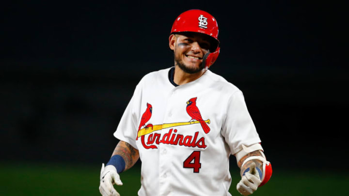 Yadier Molina #4 of the St. Louis Cardinals acknowledges teammates in the dugout after hitting an RBI single against the Milwaukee Brewers in the seventh inning at Busch Stadium on April 22, 2019 in St. Louis, Missouri. (Photo by Dilip Vishwanat/Getty Images)