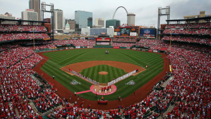 ST. LOUIS, MO - APRIL 08: General view of the St. Louis Cardinals and the Cincinnati Reds line up for the national anthem before the Opening Day on April 8, 2013 at Busch Stadium in St. Louis, Missouri. (Photo by Elsa/Getty Images)