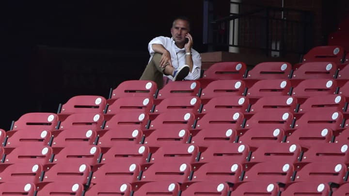John Mozeliak looks on from the seats during workouts at Busch Stadium. Mandatory Credit: Jeff Curry-USA TODAY Sports