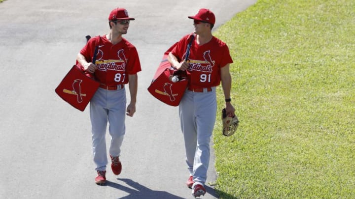 Feb 25, 2021; St. Louis Cardinals outfielders Scott Hurst (87) and Lars Nootbaar (91) walk to a field during spring training workouts at Roger Dean Stadium in Jupiter, Florida, USA; Mandatory Credit: Rhona Wise-USA TODAY Sports