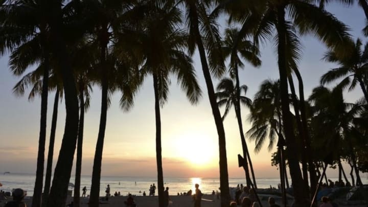 Jan 30, 2016; Honolulu, HI, USA; General view of palm trees at Waikiki Beach at sunset. Mandatory Credit: Kirby Lee-USA TODAY Sports
