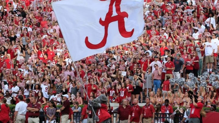 Sep 26, 2015; Tuscaloosa, AL, USA; Alabama Crimson Tide mascot Big Al waves the flag after a score at Bryant-Denny Stadium against the UL Monroe Warhawks. The Tide defeated the Warhawks 34-0. Mandatory Credit: Marvin Gentry-USA TODAY Sports