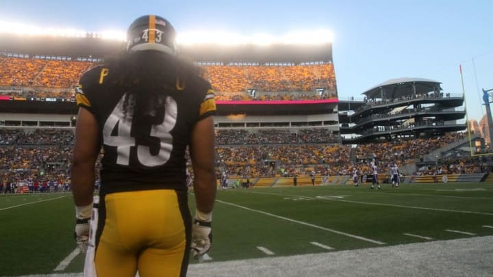 Aug 16, 2014; Pittsburgh, PA, USA; Pittsburgh Steelers safety Troy Polamalu (43) stands on the sidelines prior to the game against the Buffalo Bills at Heinz Field. The Steelers won 19-16. Mandatory Credit: Jason Bridge-USA TODAY Sports