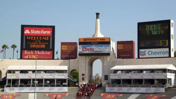 Oct 18, 2014; Los Angeles, CA, USA; General view of the peristyle end of the Los Angeles Memorial Coliseum as Southern California Trojans players arrive before the game against the Colorado Buffaloes. Mandatory Credit: Kirby Lee-USA TODAY Sports