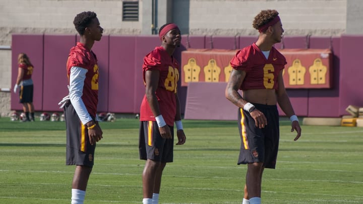 USC football players Tyler Vaughns, Deontay Burnett and Michael Pittman practice at Howard Jones Field. (Alicia de Artola/Reign of Troy)