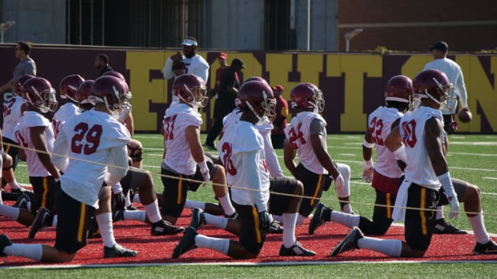 USC football players prepare for drills at Howard Jones Field. (Alicia de Artola/Reign of Troy)