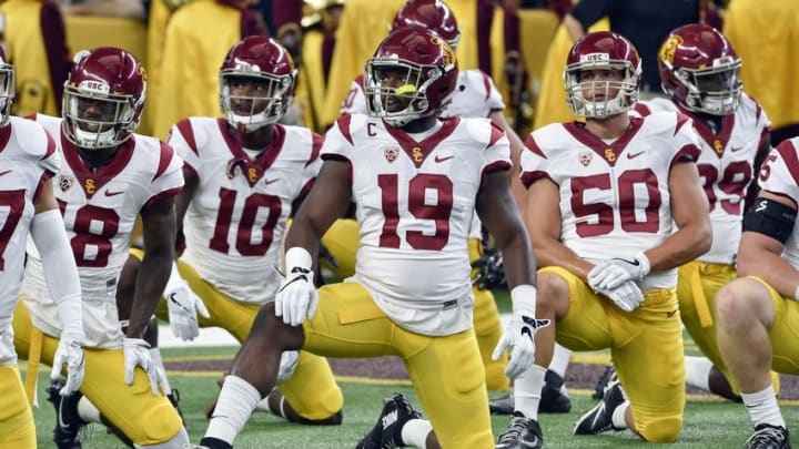 Sep 3, 2016; Arlington, TX, USA; USC Trojans players warm up before the game against the Alabama Crimson Tide at AT&T Stadium. Mandatory Credit: Jerome Miron-USA TODAY Sports