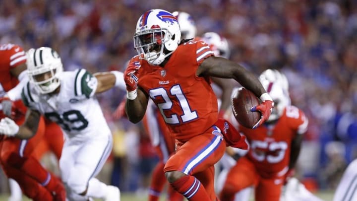 Sep 15, 2016; Orchard Park, NY, USA; Buffalo Bills defensive back Nickell Robey (21) recovers a fumble and runs for a touchdown during the second half against the New York Jets at New Era Field. The Jets beat the Bills 37-31. Mandatory Credit: Kevin Hoffman-USA TODAY Sports