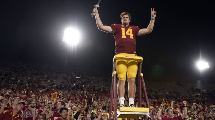 Oct 1, 2016; Los Angeles, CA, USA; Southern California Trojans quarterback Sam Darnold (14) celebrates with the student section after the game against the Arizona State Sun Devils at Los Angeles Memorial Coliseum. The Southern California Trojans won 41-20. Mandatory Credit: Kelvin Kuo-USA TODAY Sports