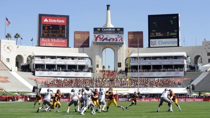 October 8, 2016; Los Angeles, CA, USA; Colorado Buffaloes quarterback Steven Montez (12) throws a pass against the Southern California Trojans during the first half at the Los Angeles Memorial Coliseum. Mandatory Credit: Gary A. Vasquez-USA TODAY Sports