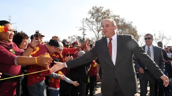 Nov 26, 2016; Los Angeles, CA, USA; Southern California Trojans head coach Clay Helton greets fans during the Trojan Walk before a NCAA football game against the Notre Dame Fighting Irish at Los Angeles Memorial Coliseum. Mandatory Credit: Kirby Lee-USA TODAY Sports