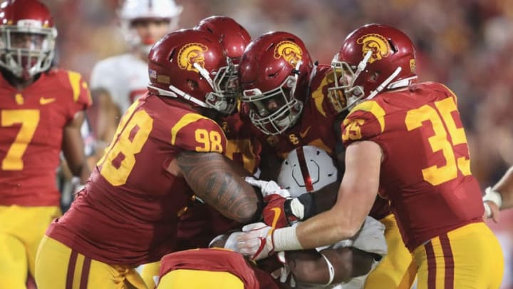 LOS ANGELES, CA - SEPTEMBER 09: The USC Trojans defense attempts to make a tackle during the second half against the Stanford Cardinal at Los Angeles Memorial Coliseum on September 9, 2017 in Los Angeles, California. (Photo by Sean M. Haffey/Getty Images)