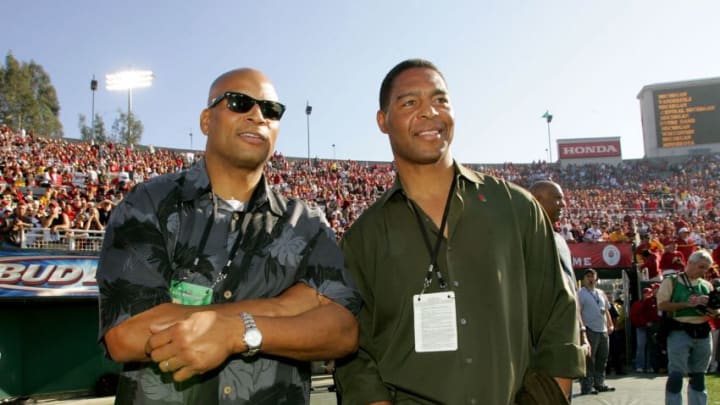 PASADENA, CA - JANUARY 01: NFL Greats and USC alumni, Ronnie Lott (L) and Marcus Allen (R) stand on the sidelines during warm ups prior to the game against the Michigan Wolverines on January 1, 2007 at the Rose Bowl in Pasadena, California. (Photo by Stephen Dunn/Getty Images)