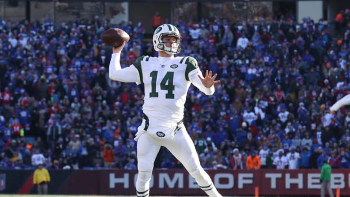 BUFFALO, NY - DECEMBER 09: Sam Darnold #14 of the New York Jets throws in the second quarter during NFL game action against the Buffalo Bills at New Era Field on December 9, 2018 in Buffalo, New York. (Photo by Tom Szczerbowski/Getty Images)