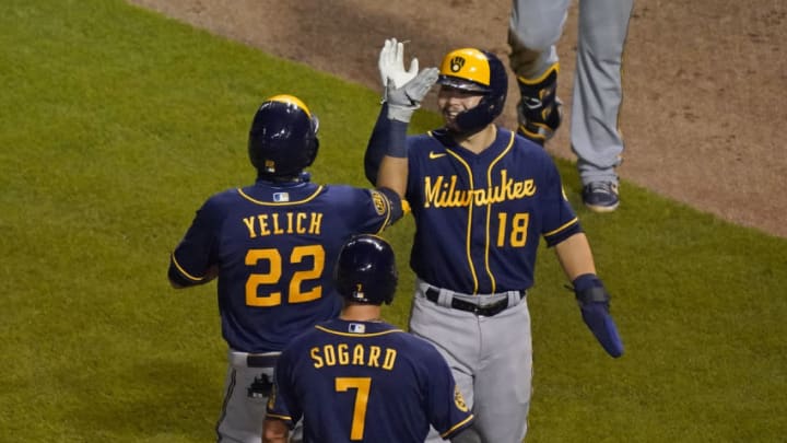 Keston Hiura, Christian Yelich, and Eric Sogard, Milwaukee Brewers (Photo by Nuccio DiNuzzo/Getty Images)