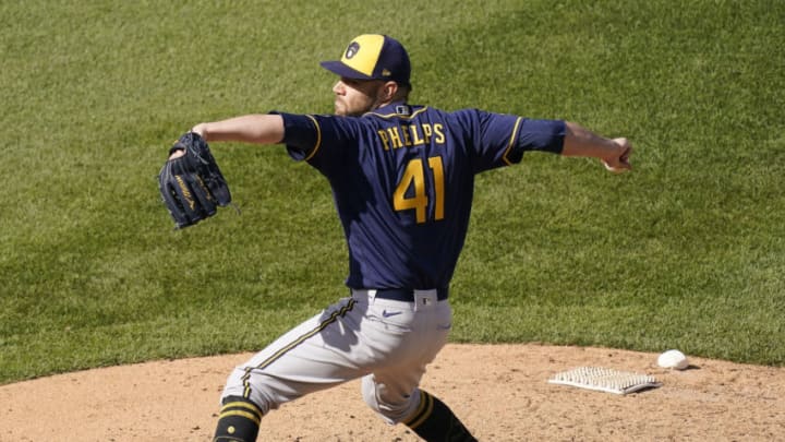 CHICAGO, ILLINOIS - AUGUST 16: David Phelps #41 of the Milwaukee Brewers throws a pitch during the eighth inning of a game against the Chicago Cubs at Wrigley Field on August 16, 2020 in Chicago, Illinois. (Photo by Nuccio DiNuzzo/Getty Images)