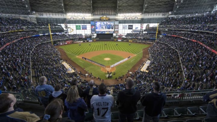 MILWAUKEE, WI - APRIL 1: General view of the Colorado Rockies and Milwaukee Brewers line the base lines during the National Anthem on opening day at Miller Park on April 1, 2013 in Milwaukee, Wisconsin. (Photo by Tom Lynn/Getty Images)
