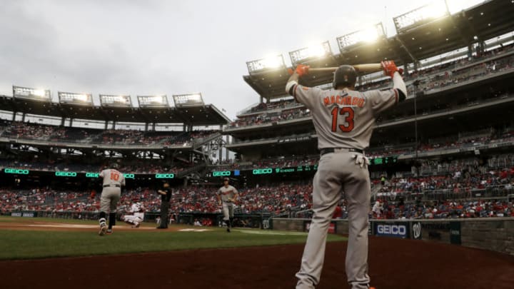 WASHINGTON, DC - JUNE 21: Adam Jones #10 of the Baltimore Orioles bats as Manny Machado #13 waits on deck in the first inning against the Washington Nationals at Nationals Park on June 21, 2018 in Washington, DC. (Photo by Rob Carr/Getty Images)