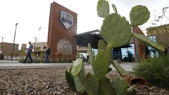 MARYVALE, - MARCH 12: Fans walk from American Family Fields stadium, spring training home of the Milwaukee Brewers, following Major League Baseball's decision to suspend all spring training games on March 12, 2020 in Phoenix, Arizona. The decision was made due to concerns of the ongoing Coronavirus (COVID-19) outbreak. (Photo by Ralph Freso/Getty Images)