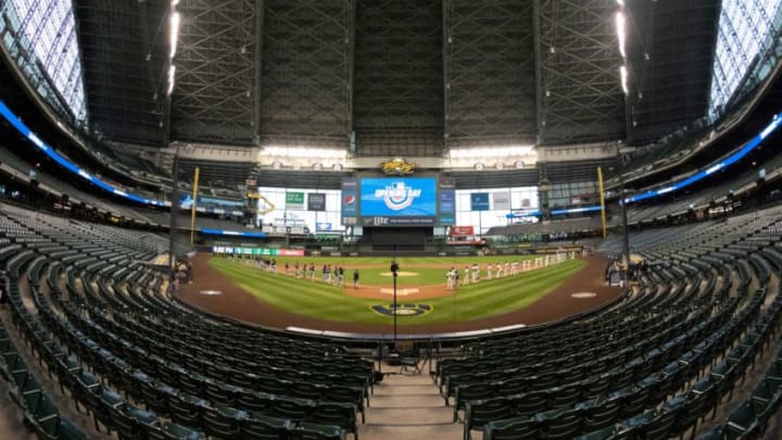 2020: The Milwaukee Brewers and Chicago White Sox line up for the first game of the pandemic-plague season at Miller Park on Aug. 3, 2020. For the first time, opening day took place with no fans in the stands.Brewers 2020 Home Opener