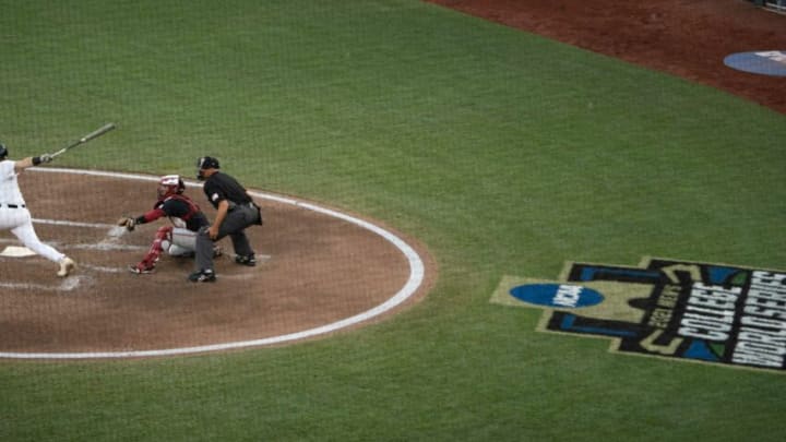 Vanderbilt first baseman Dominic Keegan (12) hits a two run home run in the bottom of the fourth inning against Stanford during game nine in the NCAA Men’s College World Series at TD Ameritrade Park Wednesday, June 23, 2021 in Omaha, Neb.Nas Vandy Stanford 036