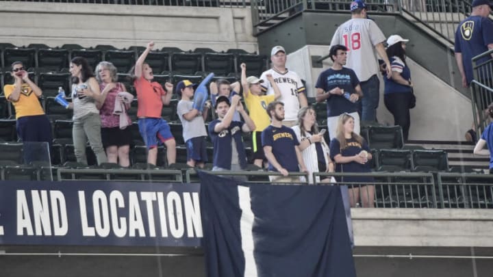 Jun 30, 2021; Milwaukee, Wisconsin, USA; Milwaukee Brewers fans cheer as they watch the Brewers sweep the Chicago Cubs at American Family Field. Mandatory Credit: Benny Sieu-USA TODAY Sports