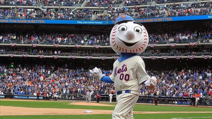 Apr 1, 2013; New York, NY, USA; Mr. Met tosses t-shirts into the stands during the seventh inning stretch of a MLB opening day game between the New York Mets and the San Diego Padres at Citi Field. Mandatory Credit: Brad Penner-USA TODAY Sports