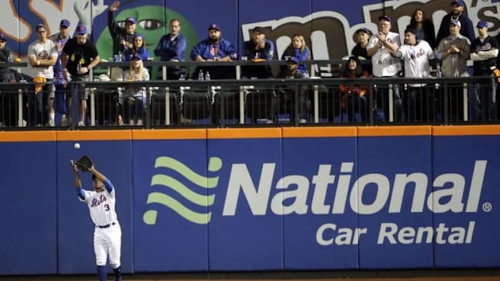 Oct 5, 2016; New York City, NY, USA; New York Mets center fielder Curtis Granderson (3) catches a fly ball during the fifth inning against the San Francisco Giants in the National League wild card playoff baseball game at Citi Field. Mandatory Credit: Anthony Gruppuso-USA TODAY Sports Oct 5, 2016; New York City, NY, USA; New York Mets center fielder Curtis Granderson (3) catches a fly ball during the fifth inning against the San Francisco Giants in the National League wild card playoff baseball game at Citi Field. Mandatory Credit: Anthony Gruppuso-USA TODAY Sports