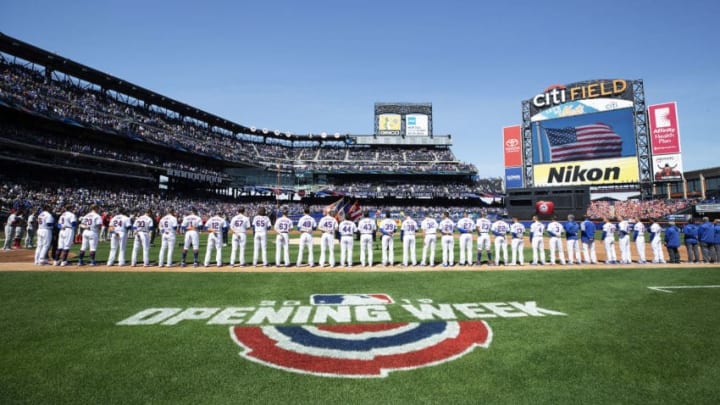 NEW YORK, NEW YORK - APRIL 04: The New York Mets stand for the National Anthem against the Washington Nationals at the Mets Home Opening game at Citi Field on April 04, 2019 in New York City. (Photo by Al Bello/Getty Images)