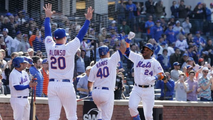 NEW YORK, NEW YORK - APRIL 06: Robinson Cano #24 of the New York Mets celebrates his eighth inning home run against the Washington Nationals with teammates Wilson Ramos #40 and Pete Alonso #20 at Citi Field on April 06, 2019 in the Flushing neighborhood of the Queens borough of New York City. (Photo by Jim McIsaac/Getty Images) NEW YORK, NEW YORK - APRIL 06: Robinson Cano #24 of the New York Mets celebrates his eighth inning home run against the Washington Nationals with teammates Wilson Ramos #40 and Pete Alonso #20 at Citi Field on April 06, 2019 in the Flushing neighborhood of the Queens borough of New York City. (Photo by Jim McIsaac/Getty Images)