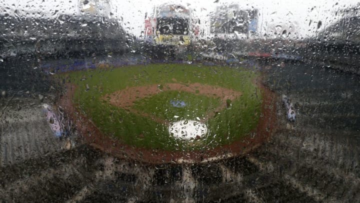 NEW YORK, NEW YORK - MAY 12: Rain drops are seen on a window at Citi Field after a game between the New York Mets and the Miami Marlins was postponed on May 12, 2019 in the Queens borough of New York City. (Photo by Jim McIsaac/Getty Images)