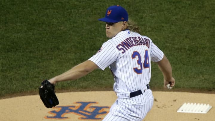 NEW YORK, NEW YORK - SEPTEMBER 13: Noah Syndergaard #34 of the New York Mets in action against the Los Angeles Dodgers at Citi Field on September 13, 2019 in New York City. The Dodgers defeated the Mets 9-2. (Photo by Jim McIsaac/Getty Images)