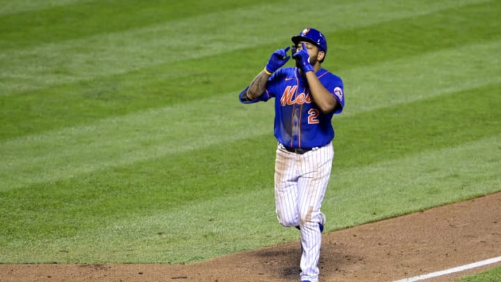 NEW YORK, NEW YORK - AUGUST 12: Dominic Smith #2 of the New York Mets hits a home run against the Washington Nationals at Citi Field on August 12, 2020 in New York City. (Photo by Steven Ryan/Getty Images)