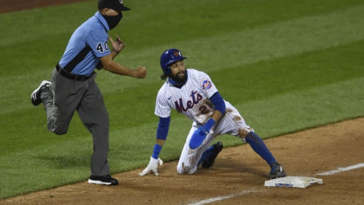 NEW YORK, NEW YORK - SEPTEMBER 03: Umpire Roberto Ortiz #40 calls Billy Hamilton #21 of the New York Mets out at third base during the ninth inning against the New York Yankees at Citi Field on September 03, 2020 in the Queens borough of New York City. (Photo by Sarah Stier/Getty Images)