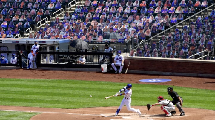 NEW YORK, NEW YORK - SEPTEMBER 06: Michael Conforto #30 of the New York Mets hits a double against the Philadelphia Phillies during the first inning at Citi Field on September 06, 2020 in New York City. (Photo by Steven Ryan/Getty Images)