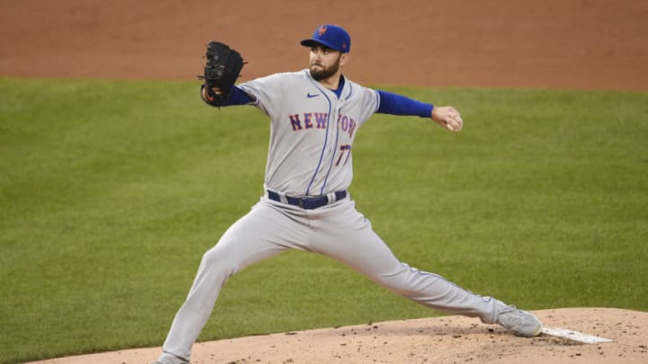 WASHINGTON, DC - SEPTEMBER 24: David Peterson #77 of the New York Mets pitches in the second inning against the Washington Nationals at Nationals Park on September 24, 2020 in Washington, DC. (Photo by Patrick McDermott/Getty Images)