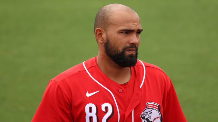 GLENDALE, ARIZONA - MARCH 25: Deivy Grullon #82 of the Cincinnati Reds looks on before the MLB spring training game against the Chicago White Sox at Camelback Ranch on March 25, 2021 in Glendale, Arizona. (Photo by Abbie Parr/Getty Images)