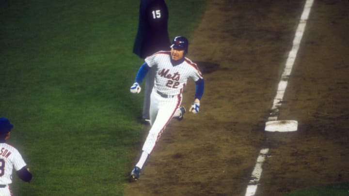 NEW YORK - OCTOBER 27: Infielder Ray Knight #22 of the New York Mets trots around the bases after hitting a home run against the Boston Red Sox during Game 7 of the 1986 World Series October 27, 1986 at Shea Stadium in the Queens borough of New York City. The Mets won the Series 4 games to 3. (Photo by Focus on Sport/Getty Images)