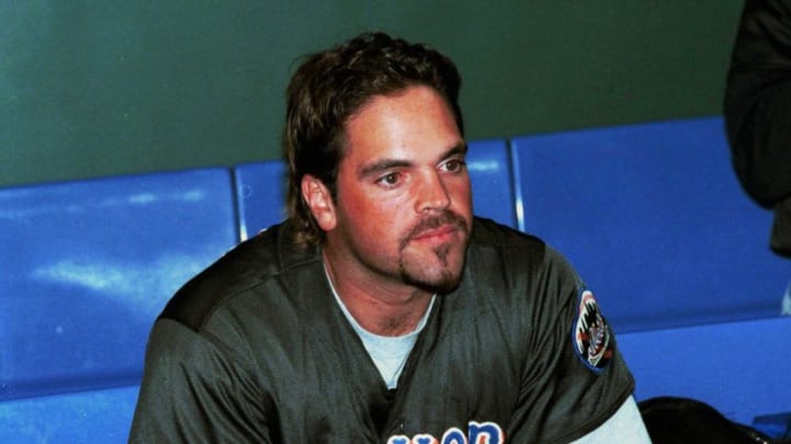 26 Mar 2000: Catcher Mike Piazza #43 of the New York Mets looks on from the dugout during battin pracice at the Tokyo Dome in Tokyo, Japan prior to the Chicago Cubs and New York Mets Opening Day game in Tokyo.