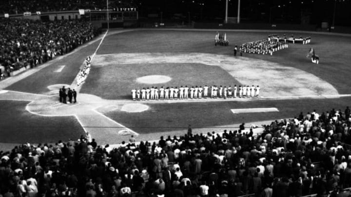 FLUSHING, NY - OCTOBER 16, 1973: The teams line up along the first and third basepaths prior to game three of the World Series on October 16, 1973 between the Oakland A's and the New York Mets at Shea Stadium in Flushing, New York. 73N3592 (Photo by: Olen Collection/Diamond Images/Getty Images)