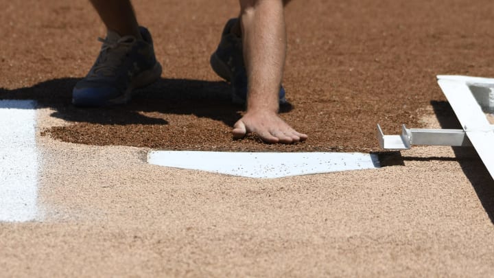CHICAGO, ILLINOIS – JUNE 22: A details shot of a home plate before the game between the Chicago Cubs and the New York Mets at Wrigley Field on June 22, 2019 in Chicago, Illinois. (Photo by David Banks/Getty Images)