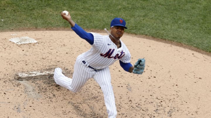 NEW YORK, NEW YORK - AUGUST 01: Marcus Stroman #0 of the New York Mets in action against the Cincinnati Reds at Citi Field on August 01, 2021 in New York City. The Reds defeated the Mets 7-1. (Photo by Jim McIsaac/Getty Images)