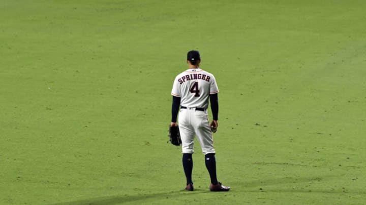 Oct 13, 2020; San Diego, California, USA; Houston Astros center fielder George Springer (4) against the Tampa Bay Rays during the seventh inning in game three of the 2020 ALCS at Petco Park. Mandatory Credit: Robert Hanashiro-USA TODAY Sports