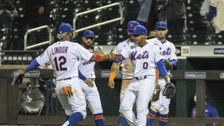 Apr 13, 2021; New York City, New York, USA; New York Mets pitcher Marcus Stroman (0) congratulates shortstop Francisco Lindor (12) after a double play against the Philadelphia Phillies to end the top of the sixth inning at Citi Field. Mandatory Credit: Wendell Cruz-USA TODAY Sports