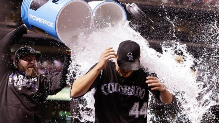 Jul 9, 2016; Denver, CO, USA; Colorado Rockies starting pitcher Tyler Anderson (44) is doused with water by teammates following the game against the Philadelphia Phillies at Coors Field. The Rockies defeated the Phillies 8-3. Mandatory Credit: Isaiah J. Downing-USA TODAY Sports