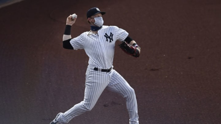 NEW YORK, NEW YORK - AUGUST 18: Clint Frazier #77 of the New York Yankees throws from right field during the third inning against the Tampa Bay Rays at Yankee Stadium on August 18, 2020 in the Bronx borough of New York City. (Photo by Sarah Stier/Getty Images)