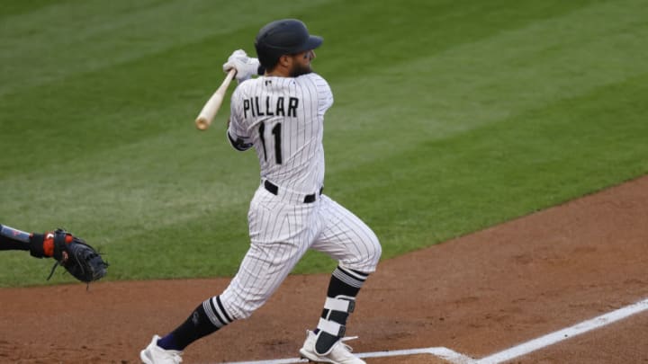 DENVER, CO - AUGUST 1: Kevin Pillar #11 of the Colorado Rockies bats during the first inning against the San Francisco Giants at Coors Field on September 1, 2020 in Denver, Colorado. (Photo by Justin Edmonds/Getty Images)