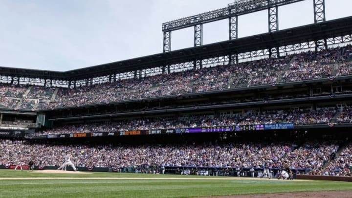DENVER, COLORADO - APRIL 08: Starting pitcher Jordan Lyles #24 of the Colorado Rockies delivers the first pitch of the game against the San Diego Padres during opening day at Coors Field on April 8, 2016 in Denver, Colorado. Lyles collected the loss as the Padres defeated the Rockies 13-6. (Photo by Doug Pensinger/Getty Images)