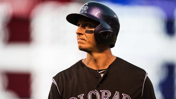 DENVER, CO – JULY 25: Troy Tulowitzki #2 of the Colorado Rockies reacts after flying out in the seventh inning of a game against the Cincinnati Reds at Coors Field on July 25, 2015 in Denver, Colorado. (Photo by Dustin Bradford/Getty Images)